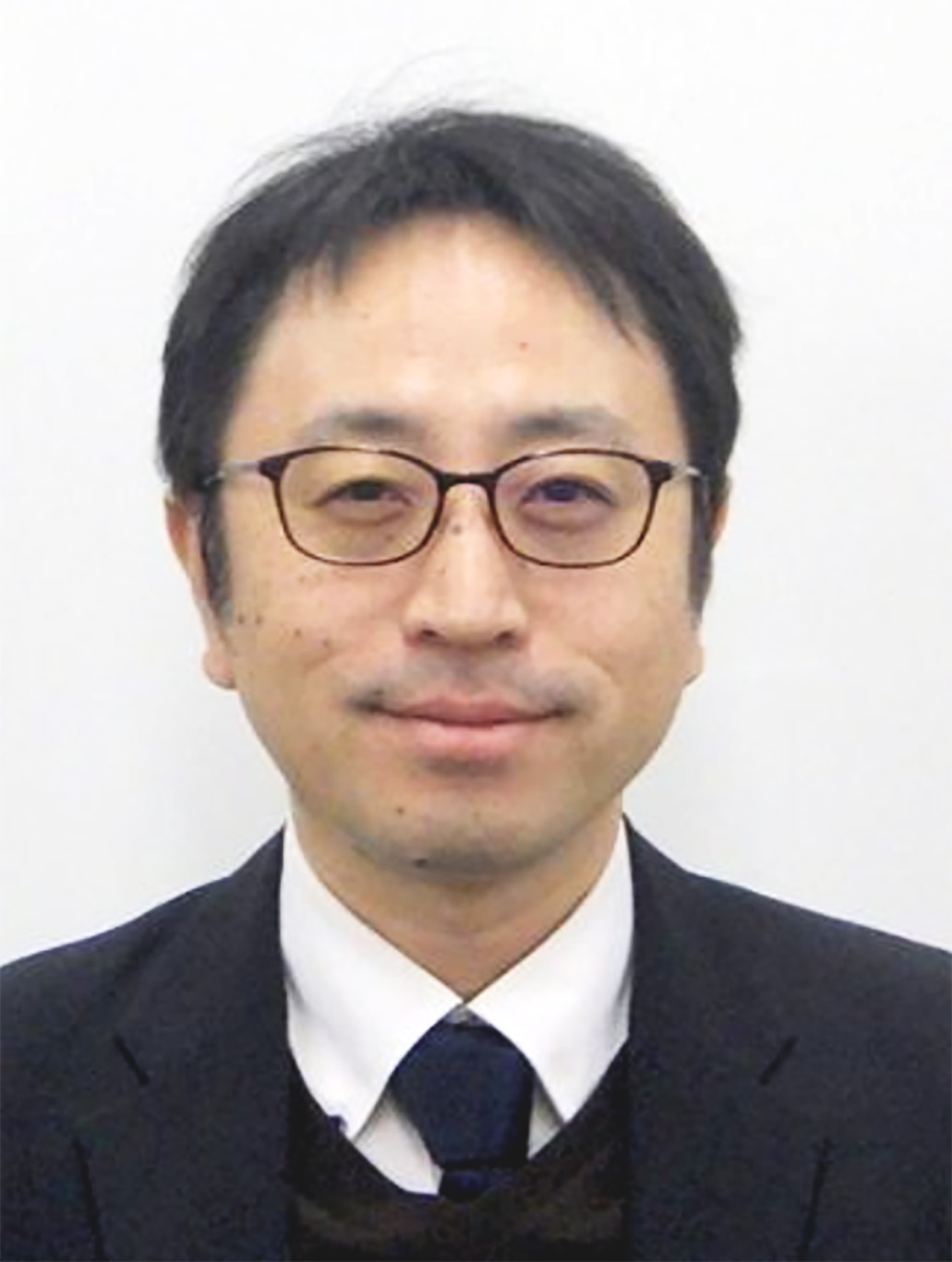 関 洋治